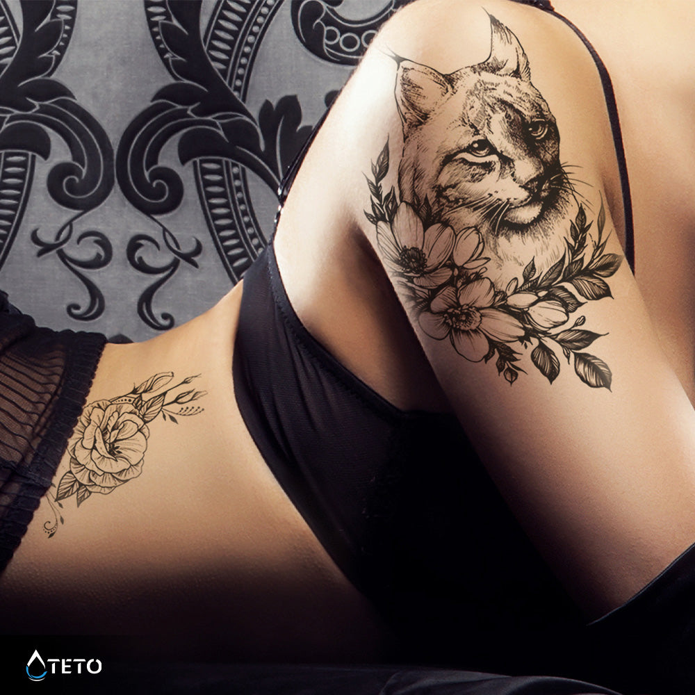 Luchs mit einer Blume
