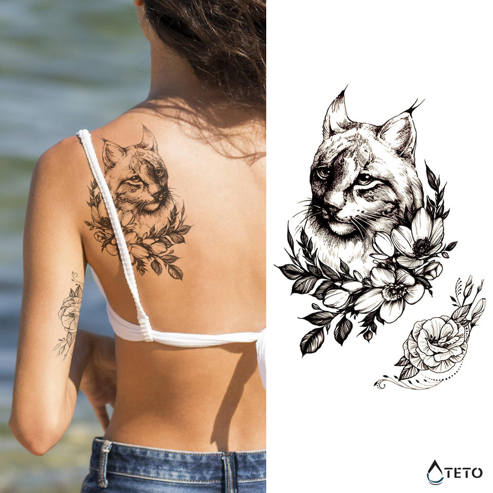 Luchs mit einer Blume