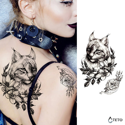 Luchs mit einer Blume