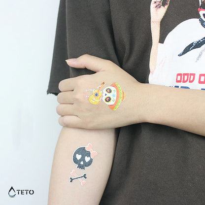 Niedlicher Totenschädel - Leuchtet im Dunkeln - TETO Temporäre Tattoos